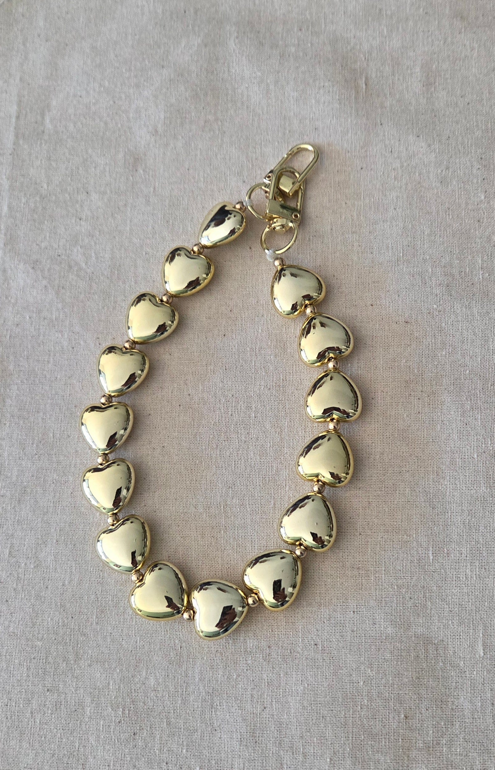 Gouden Hartjes Telefoonarmband